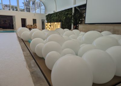 balloon in a pool with the prop house Brisbane