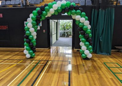 balloon arch green white black